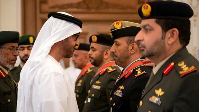 Sheikh Mohamed bin Zayed presents an Emirates Military Medals to members of the UAE Armed Forces, Ministry of Interior and Abu Dhabi Police during a Sea Palace barza.