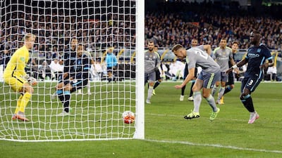 Real Madrid's Denis Cherysheve heads in his side's fourth goal in a 4-1 pre-season tour match win over Manchester City in Australia on Friday. Jason O'Brien / Action Images / Reuters