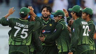 Shahid Afridi, centre, came out of retirement to take three wickets against Sri Lanka.