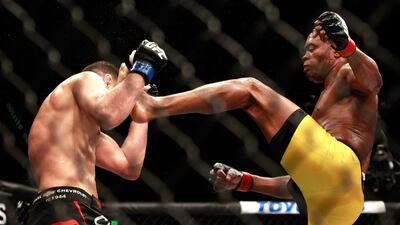 Anderson Silva kicks Nick Diaz during his unanimous victory in the main bout at UFC 183 in Las Vegas on Saturday. Steve Marcus / Getty Images / AFP