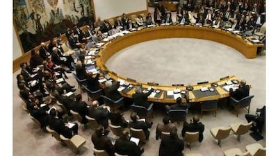 The United Nations Security Council votes on a resolution to condemn continued Israeli settlement expansion. A reader says that the US veto damaged its credibility in the Middle East. John McIlwaine / AFP / United National Photo