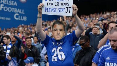 Chelsea fan holds up a banner for John Terry. Action Images via Reuters / Tony O’Brien