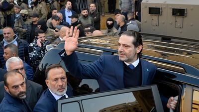 Saad Hariri waves to his supporters. EPA