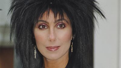 Cher, with a voluminous mullet, pictured in London, England, while promoting 'Mask' on June 26, 1985. Getty Images