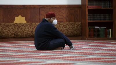 Adnan Ell Kadri listens to prayers in a nearly empty room at Masjid Al Salaam on the first full day of Ramadan on April 24, 2020 in Dearborn, Michigan. Getty Images via AFP