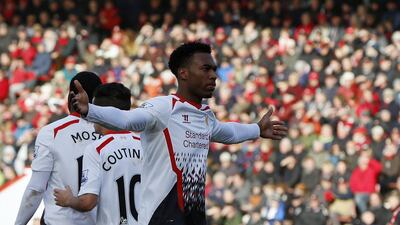Daniel Sturridge celebrates after scoring Liverpool's second goal on Saturday. Adrian Dennis / AFP