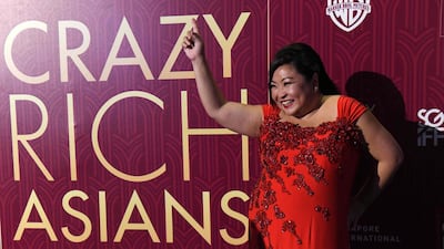 Singaporean performer Selena Tan posing at the premiere of the film 'Crazy Rich Asians' at the Capitol Theatre in Singapore. Roslan Rahman / AFP