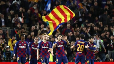 Luis Suarez, centre, celebrates with Barcelona teammates. Getty