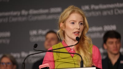 Ms Spencer speaks after the vote count. Getty Images