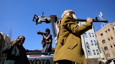 Armed tribesmen participate in an anti-Israel gathering mobilising more fighters, in Sanaa. EPA