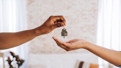 The obligation to pay service charges applies once a person obtains possession of their property, not before. Getty Images