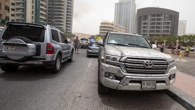 A car damaged from the burning Zen Tower. Leslie Pableo for The National