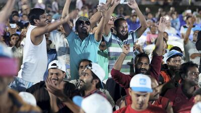 Workers enjoy the Camp Ka Champ – DU singer of the Season competition.