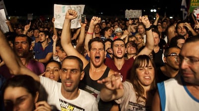 Israelis take part in a demonstration calling for lower living costs in Tel Aviv as part of the tent protest movement. Nir Elias / Reuters