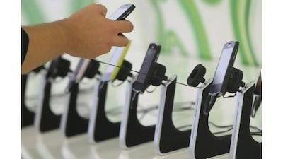 A reader says mobile phones often infringe on our privacy and cause disturbances in our lives. Sean Gallup / Getty Images