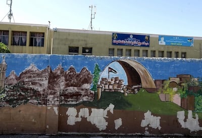 A colourful graffiti is seen on the exterior walls of a government school in Amman. More than 1,000 government schools were said to have “broken the strike” and held classes. EPA