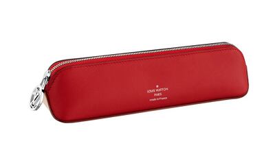A leather pencil case with a buckle embossed with the house's initials. Courtesy Louis Vuitton
