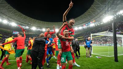 Morocco's players celebrate after another stunning win at the World Cup. AP Photo