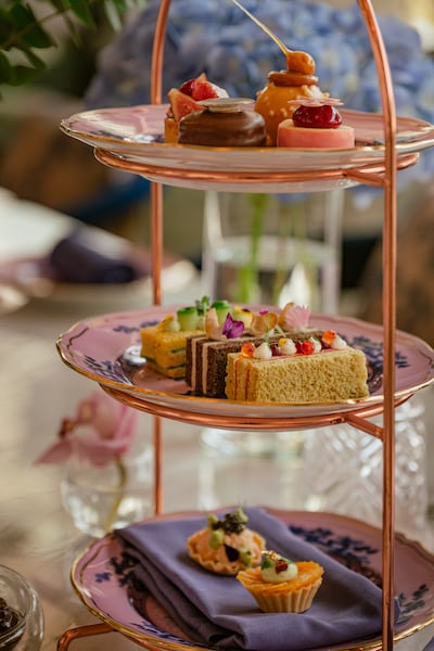 Ginori Terrace afternoon tea presents artisanal pastries and savoury delicacies against the backdrop of the Dubai Water Canal. Photo: The St Regis Downtown Dubai
