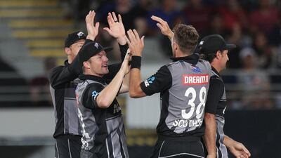New Zealand celebrate after taking the wicket of Virat Kohli. AFP