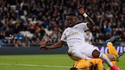 Real Madrid's Brazilian forward Vinicius Junior challenges Celta Vigo's Spanish goalkeeper Ruben Blanco. AFP