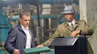 Matt Damon, left, and Anthony Mackie in The Adjustment Bureau.