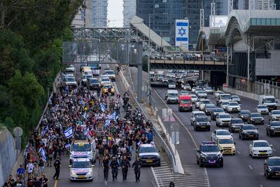 Families and friends the hostages on the "March for the Hostages" from Tel Aviv to the Prime Minister's Office in Jerusalem, in Tel Aviv, Israel. AP Photo