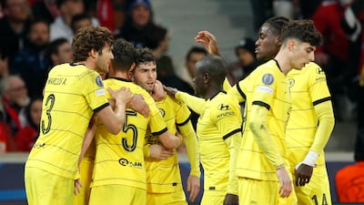 Chelsea's Christian Pulisic celebrates with teammates after scoring the equaliser. EPA