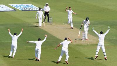 James Anderson of England celebrates bowling Shan Masood of Pakistan our during the first day of the first Test on Tuesday in Abu Dhabi. Gareth Copley / Getty Images