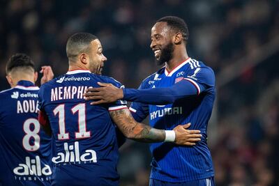 Lyon striker Moussa Dembele, right, is a transfer target for Atletico Madrid. Getty Images