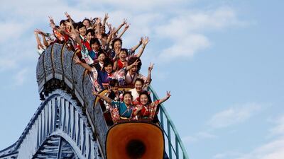 Japanese women on a roller coaster during their Coming of Age Day celebration ceremony at an amusement park in Tokyo, Japan. Reuters