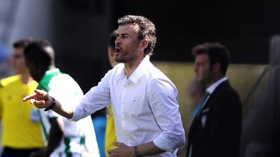 Barcelona's Luis Enrique instructs his side during their La Liga win against Cordoba on Saturday. Cristina Quicler / AFP / May 2, 2015