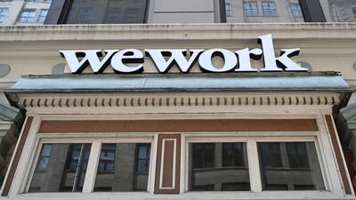 WeWork to proceed with IPO plans despite valuation worries. AFP