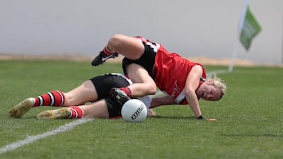 Team Asia 1, in red, plays against team Asia 2 in the Gaelic football tournament during the GAA World Games at Zayed Sports City in Abu Dhabi on March 6, 2015. Christopher Pike / The National