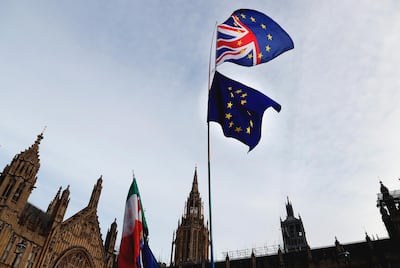Protest flags outside Parliament. Frank Augstein / AP