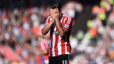 Southampton striker Graziano Pelle buries his head in his hands after missing a chance against Manchester United. Tony O’Brien / Reuters