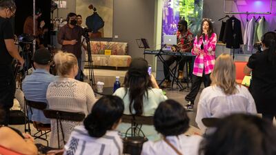Emirati-British singer Alya entertains shoppers.