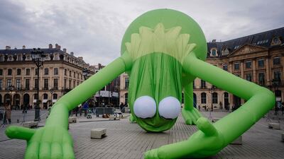 Venezuelan-US artist Alex Da Corte's artwork, titled 'Kermit the Frog, Even', is installed at Place Vendome in Paris, ahead of the official opening of the Art Basel contemporary and modern art market. AFP