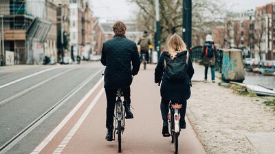Amsterdam is famous for its cyclists. Unsplash