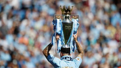 Manchester City's Kyle Walker celebrates with the trophy after winning the Premier League title. Carl Recine / Action Images via Reuters