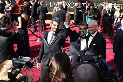 (From L) Syrian producer Kareem Abeed, director Feras Fayyad and Danish producer Soren Steen Jespersen arrive for the 90th Annual Academy Awards on March 4, 2018, in Hollywood, California. / AFP PHOTO / Robyn BECK