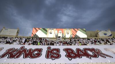 Sharjah fans display a giant banner ahead of the Asian Champions League game against Al Taawoun. Chris Whiteoak / The National