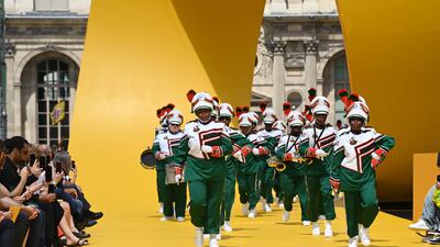 Louis Vuitton cranked up the volume at Paris Fashion Week on Thursday, spiriting Florida's famous Marching 100 band into the heart of the Louvre to kick off a show for its latest line-up of colourful menswear styles. Getty Images