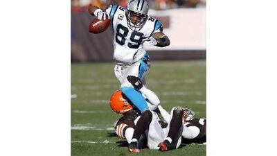 Steve Smith breaks a tackle against Cleveland.