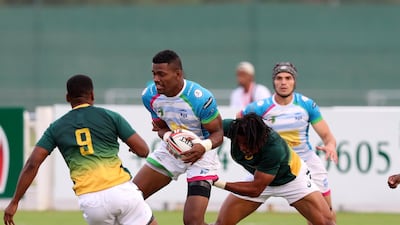 Jiuta Wainiqolo of Speranza takes on the South Africas defence in Dubai. Chris Whiteoak / The National