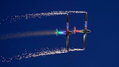 Two Grob 109b motor gliders perform a pyrotechnic display during a preview for the Icons of the Sky festival, at the Longleat estate in south-west England. PA Photo