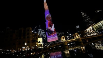 Images of Kobe Bryant and and his daughter Gianna appear on the Burj Khalifa. AP Photo