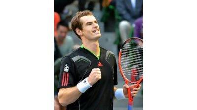 Andy Murray celebrates beating Rafael Nadal in Japan on Sunday for his second title in two weeks.