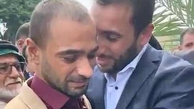 Haider Jawad Al Mousawi, right, hugs his younger brother Ahmed at their meeting in Baghdad on October 3, 2020, after 40 years of separation. Courtesy Sayed Haidar