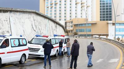 Libyan security forces and emergency services surround Tripoli's central Corinthia Hotel on January 27. AFP Photo
